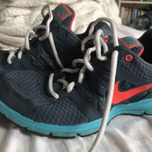 Teal, pink and gray Nike sneakers